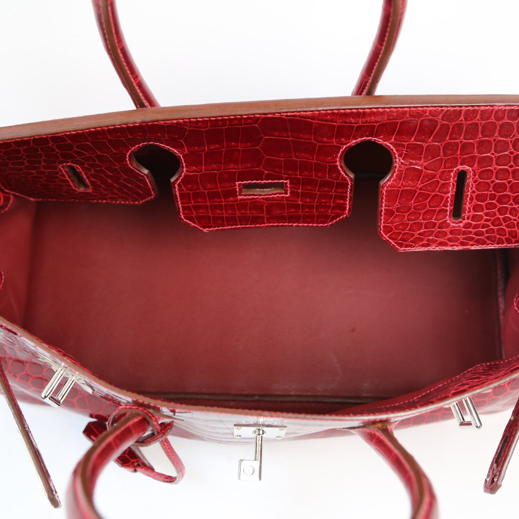 Hermès JPG Shoulder Birkin 42 Red Porosus PHW leather shoulder bag with gold hardware and structured design.
