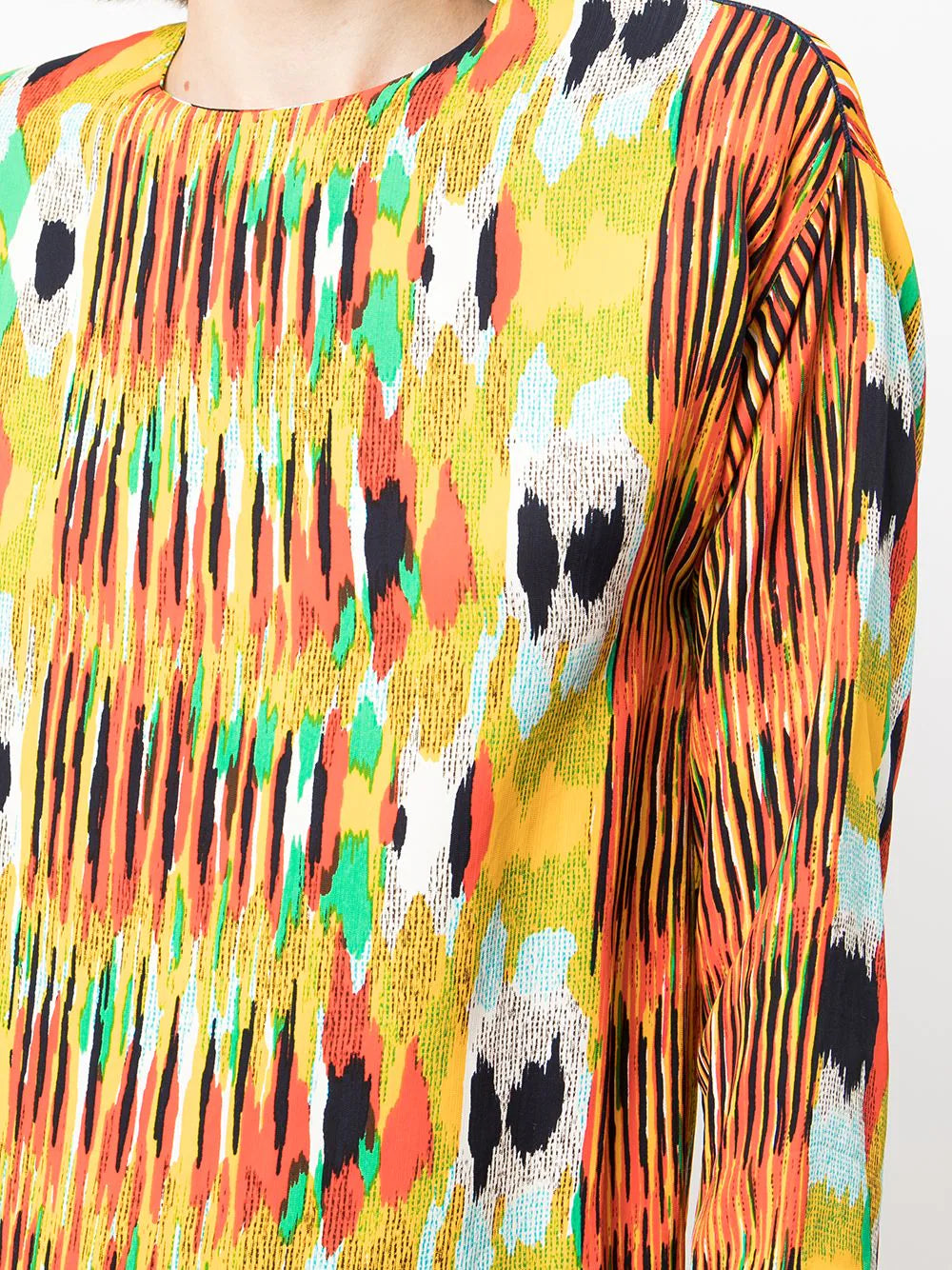 Celine printed crew neck blouse featuring a stylish pattern, long sleeves, and a relaxed fit, perfect for casual or office wear.