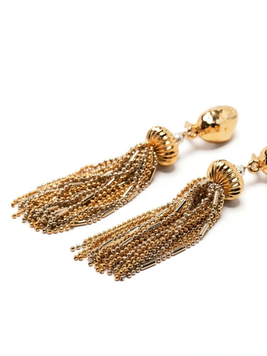 Vintage Finds Goossens gold tangle clip-on earrings with intricate design and polished finish, perfect for elegant accessories.