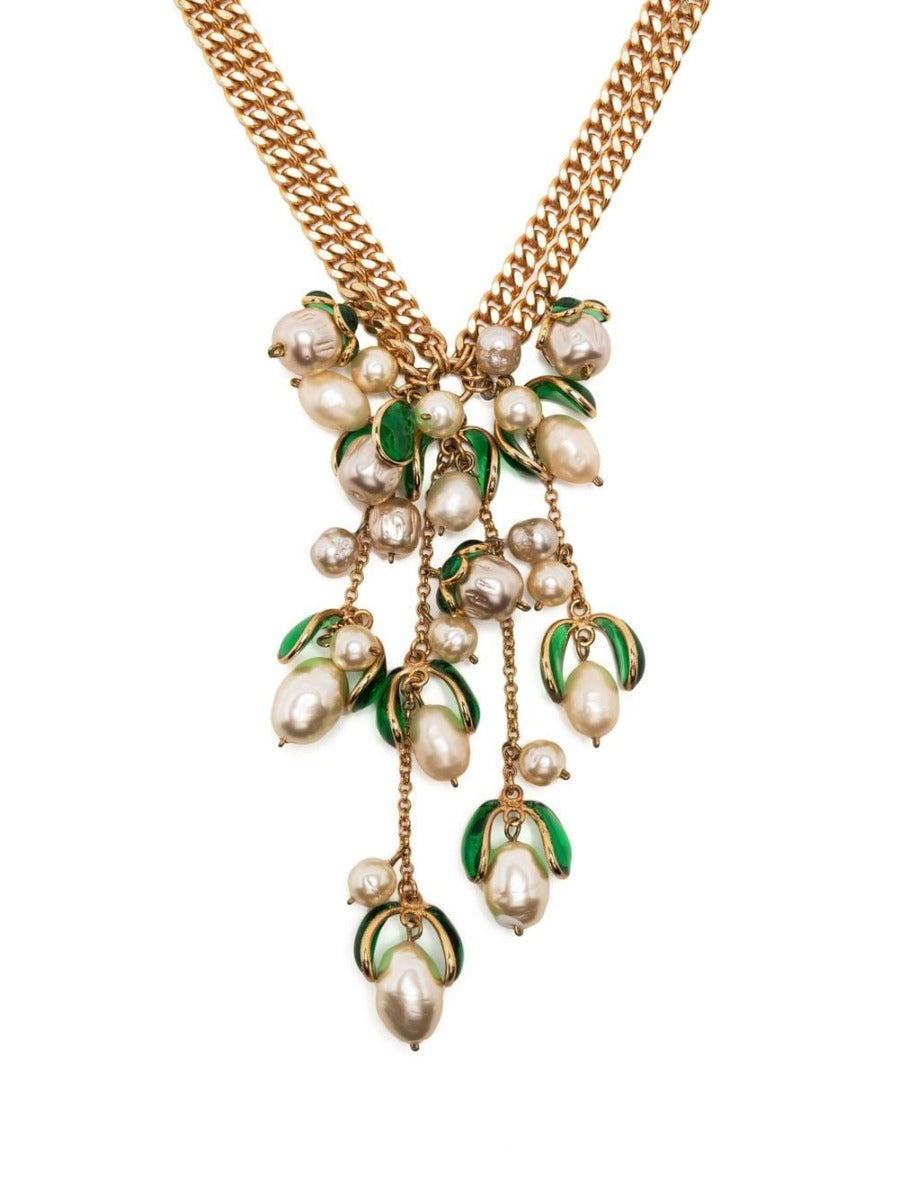 Green Petal Pendant Necklace by Vintage Finds, featuring elegant glass petal charms on a delicate chain.