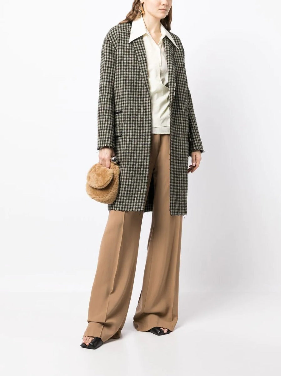 Celine Pre-Fall 2011 Phoebe Philo runway coat in neutral fabric, tailored design with classic lapels and sleek silhouette.