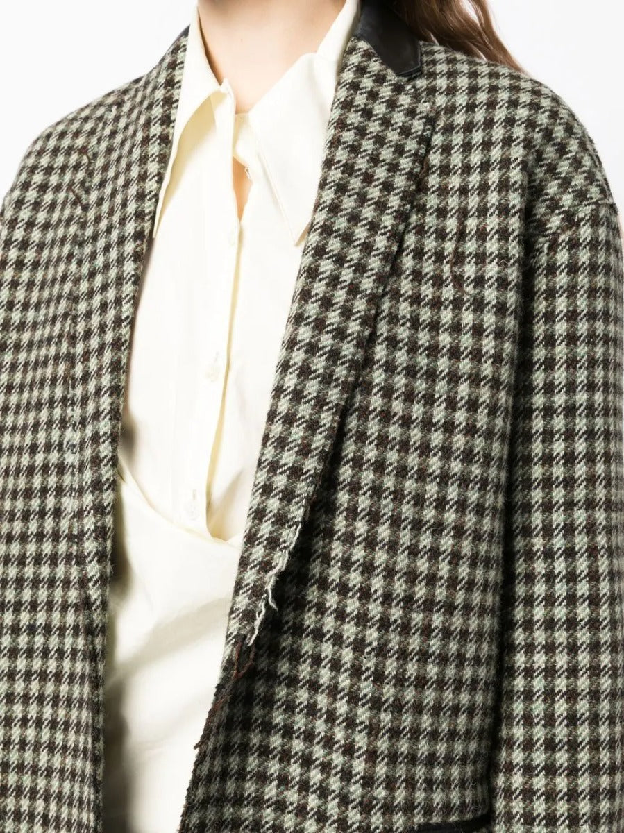 Celine Pre-Fall 2011 Phoebe Philo runway coat in neutral fabric, tailored fit, and classic design shown on runway model.