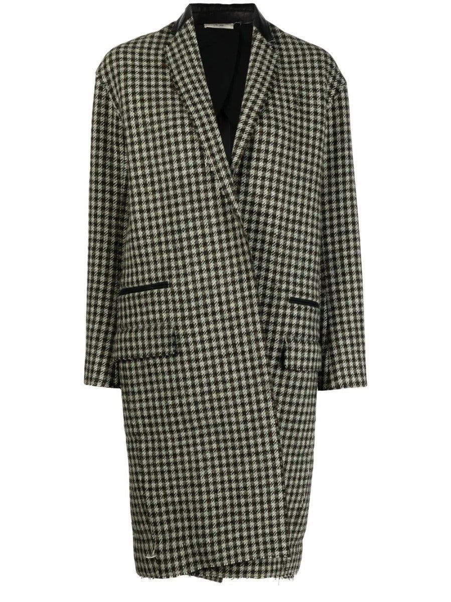 Celine Pre-Fall 2011 Phoebe Philo runway coat in neutral fabric with tailored fit and classic design, displayed on model.