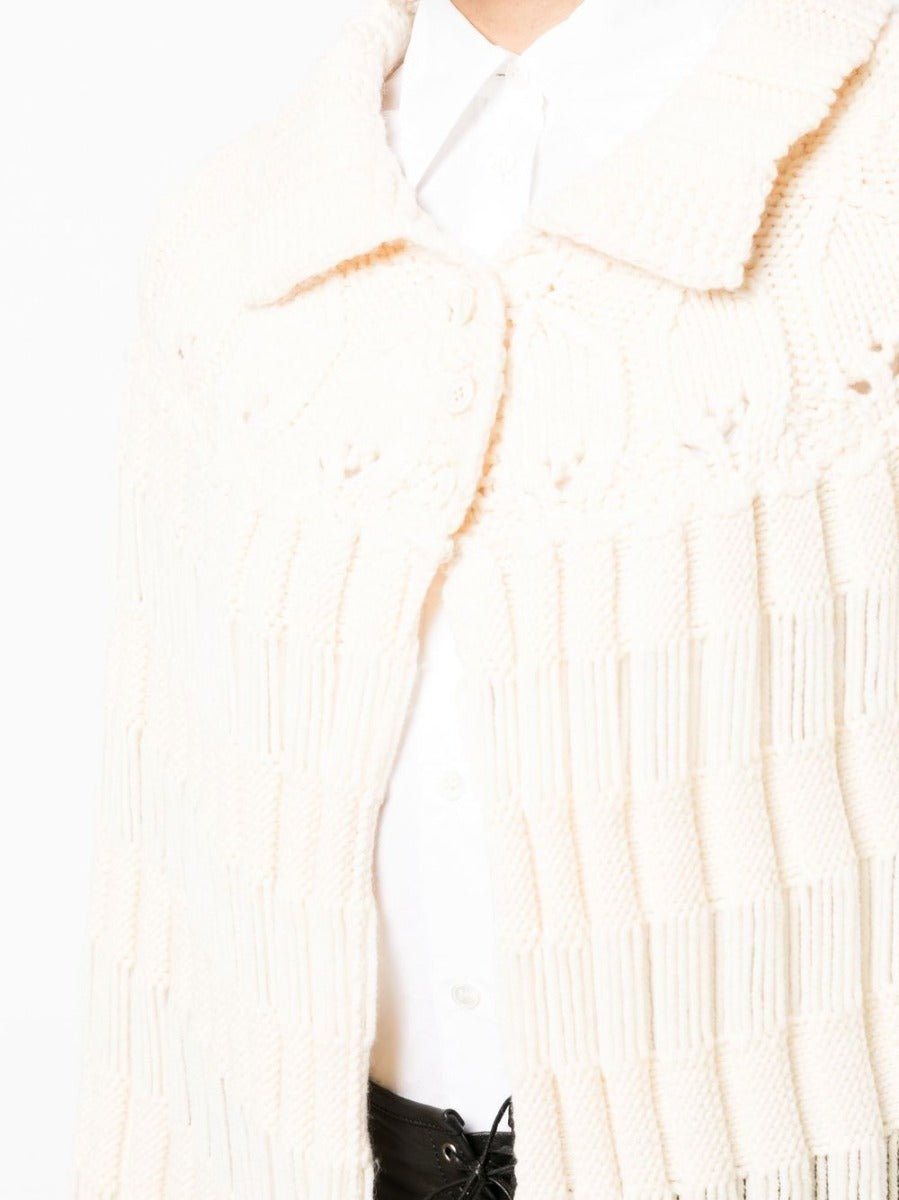 Saint Laurent chunky knit crochet poncho featuring a textured, oversized design perfect for stylish layered looks.