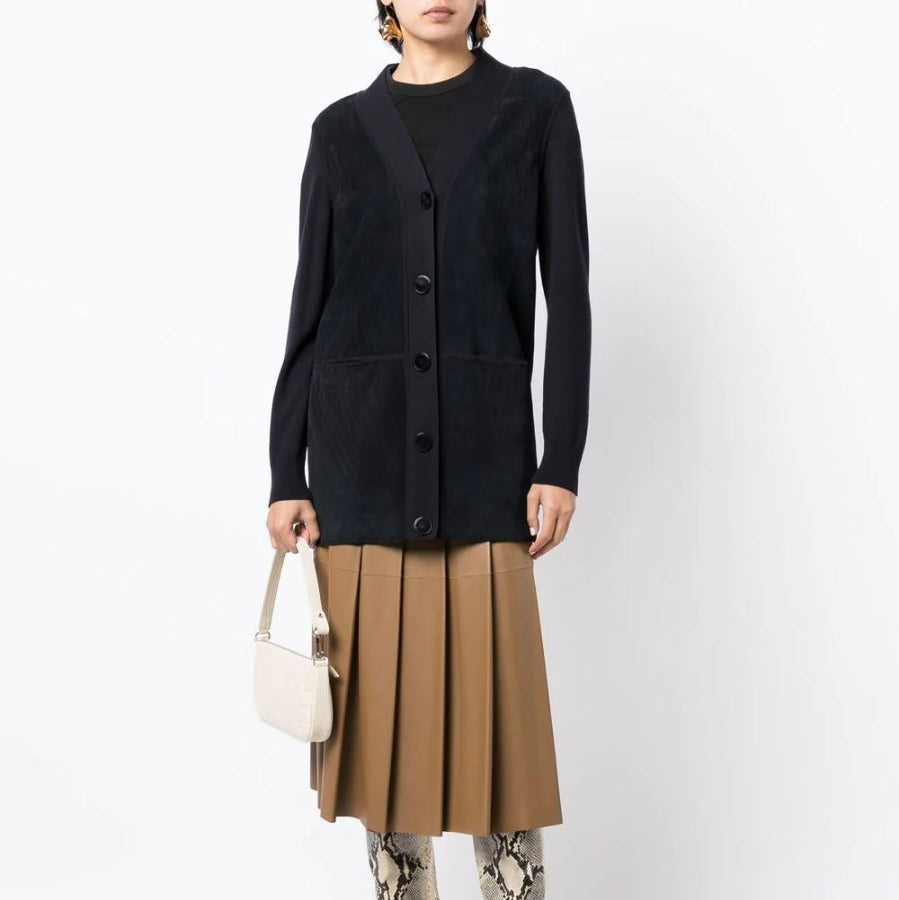 Hermès navy V-neck suede cardigan, a stylish blazer or jacket with a smooth texture and classic design.