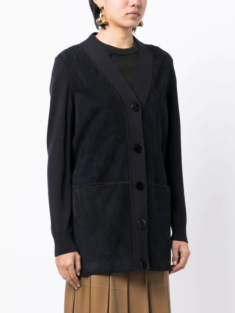 Hermès navy V-neck suede cardigan, a stylish blazer or jacket with a smooth texture and classic design.