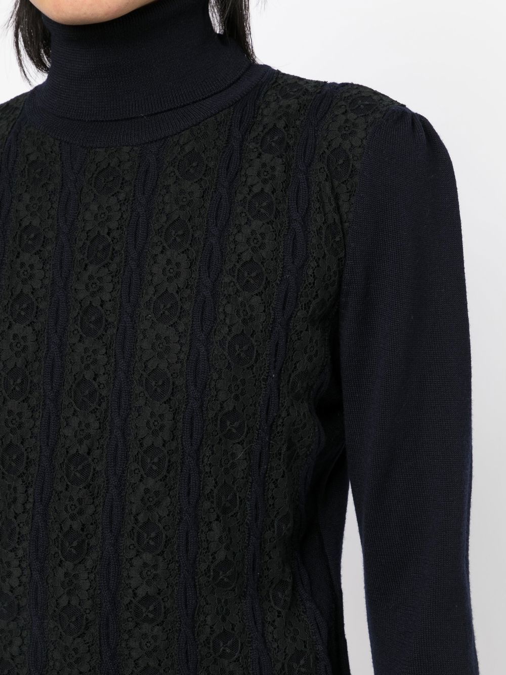 Lace panelled turtleneck jumper from Other Designers, featuring a fitted top with lace detailing and a high neckline.
