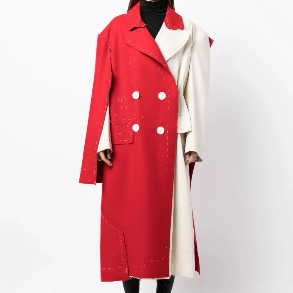 Maison Margiela deconstructed coat with layered, unfinished design, showcasing unique style and craftsmanship in a high-fashion coat.
