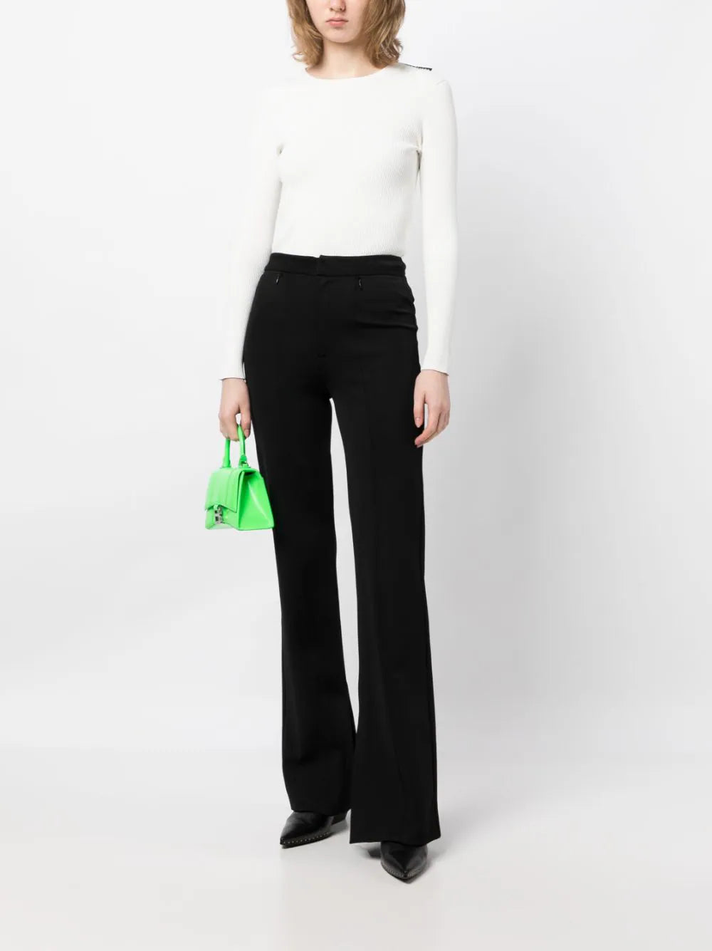 Balenciaga ribbed knit long-sleeved top, close-up of textured fabric and fitted design, in a neutral color.
