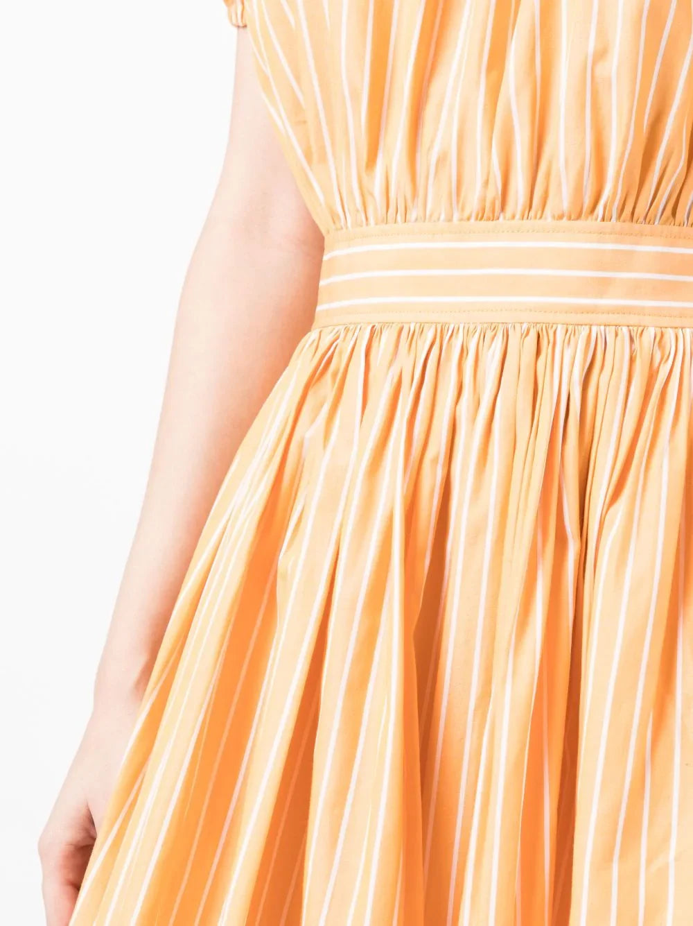 Miu Miu off-shoulder ruffle dress with feminine design, featuring layered ruffles and a fitted silhouette in elegant fabric.