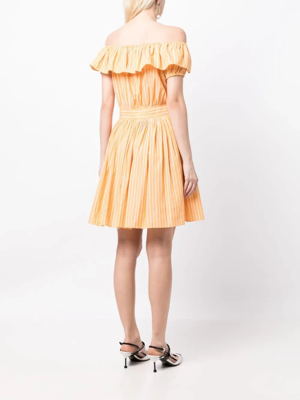 Miu Miu off-shoulder ruffle dress with feminine design, featuring flowing fabric and delicate ruffle details on the shoulders.