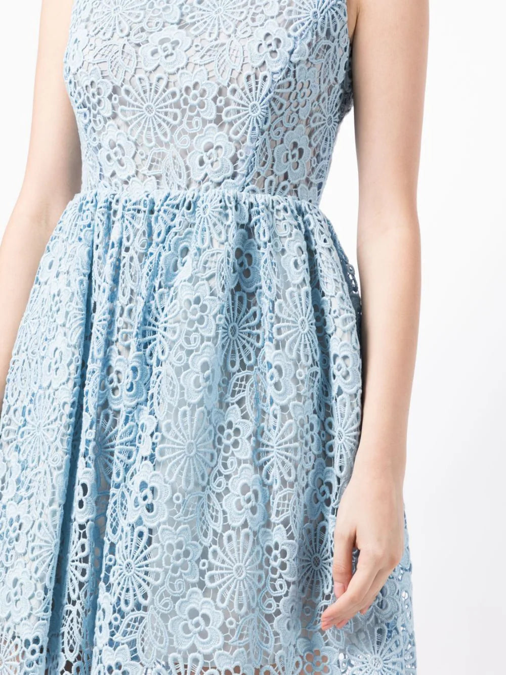 Miu Miu Guipure lace dress with intricate floral patterns, sleeveless design, and elegant fit, perfect for formal occasions.