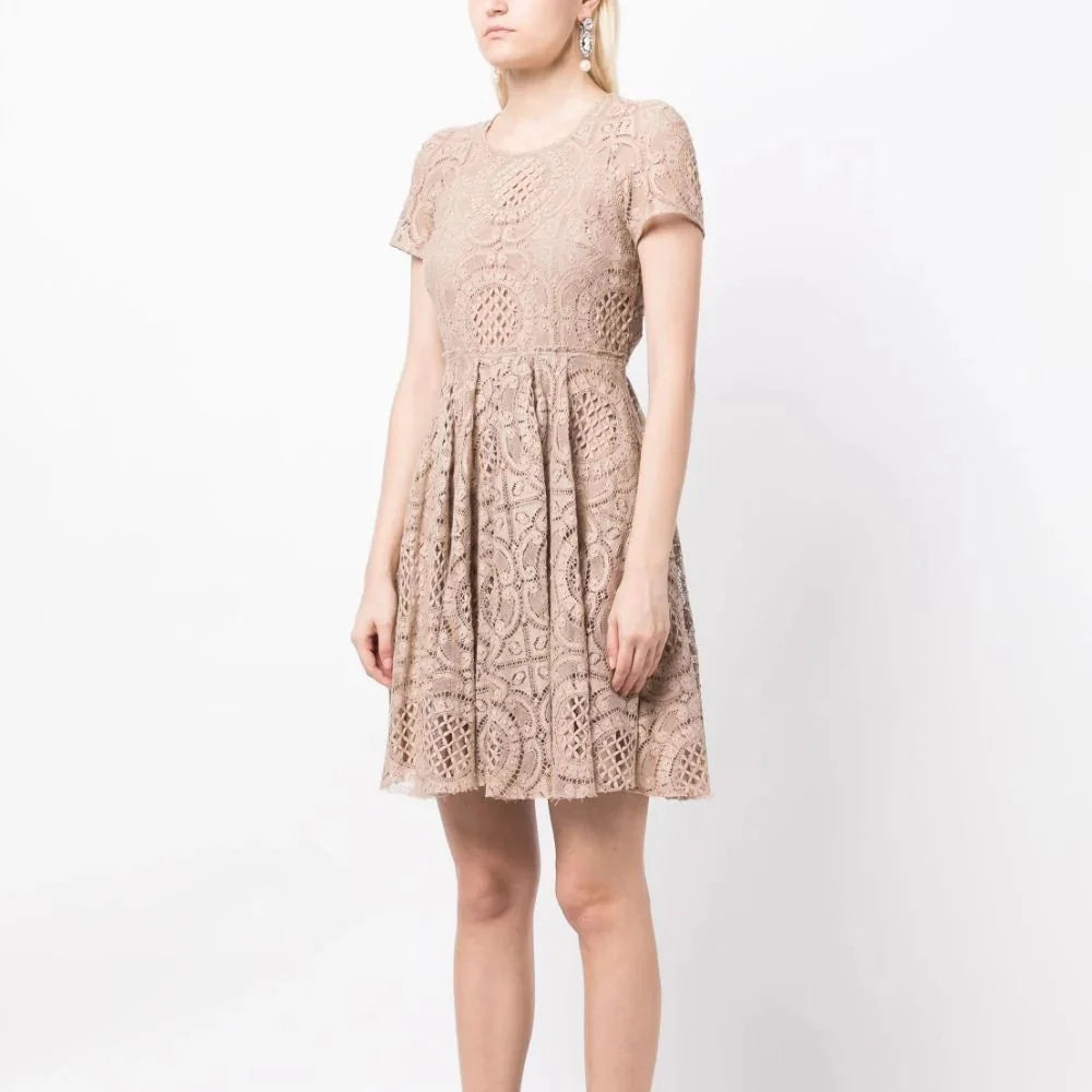 Elegant Burberry lace dress featuring intricate lace detailing and a classic silhouette, perfect for formal occasions.