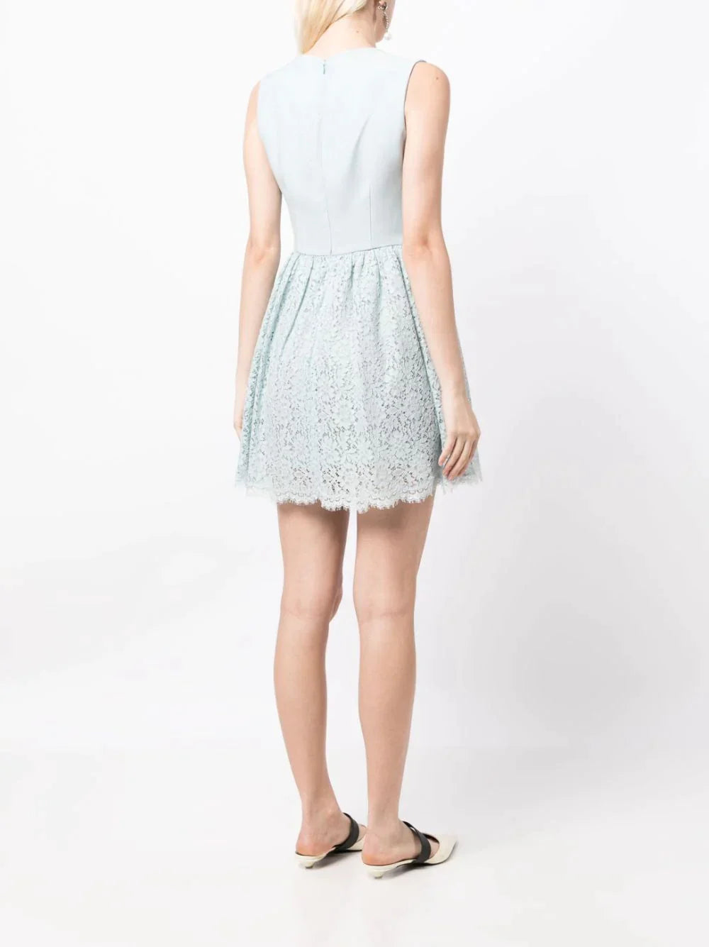 Miu Miu lace A-line dress with intricate floral lace details and a flowing silhouette, perfect for elegant occasions.