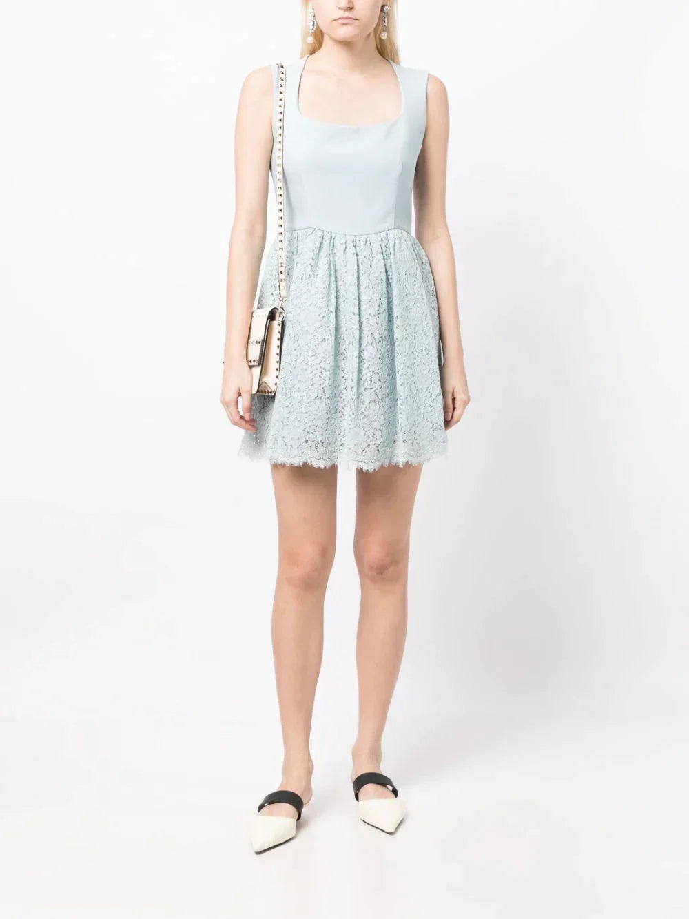 Miu Miu lace A-line dress with delicate floral pattern and elegant knee-length design, perfect for formal occasions