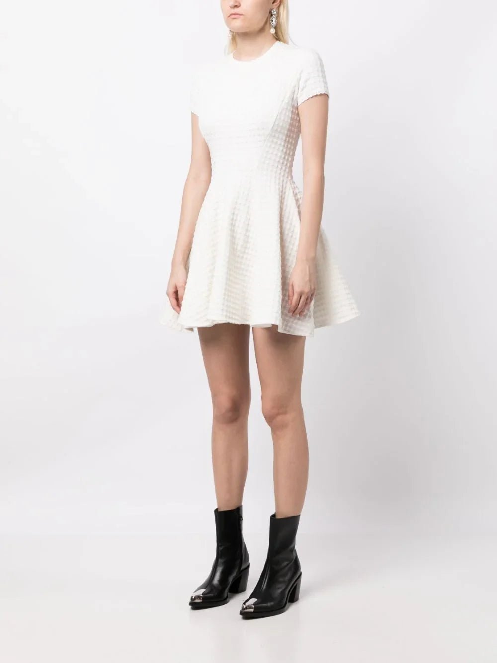 Miu Miu Jacquard A-line dress with intricate pattern and elegant silhouette, showcased on a neutral background.
