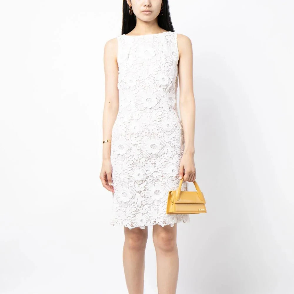 Prada Floral Broderie Anglaise Special Edition Dress featuring delicate embroidered floral patterns and elegant design.