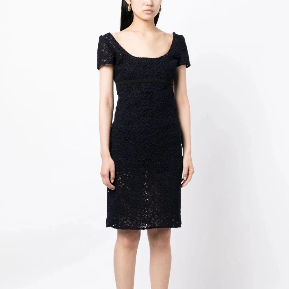 Prada empire waist floral lace dress with fitted bodice and flowing skirt, elegant and feminine evening dress.