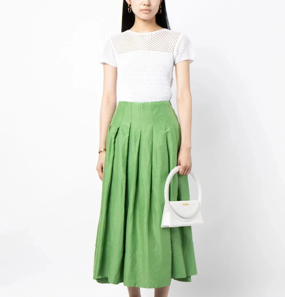 Prada short-sleeved crochet top with intricate knit pattern, lightweight fabric, and classic design, perfect for casual or stylish wear.