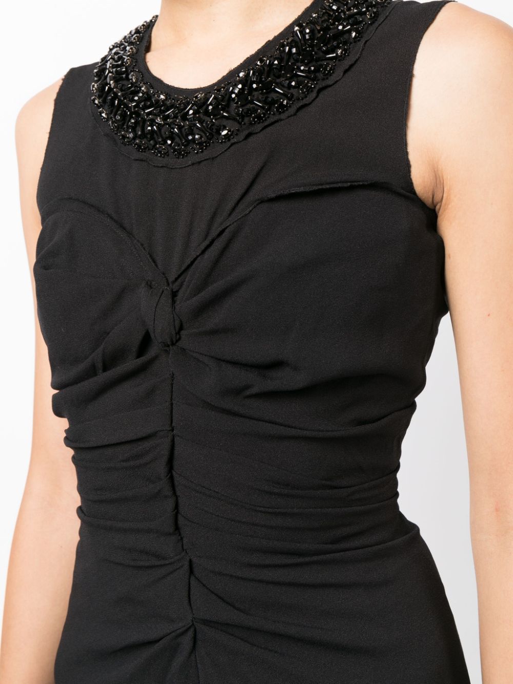 Prada sleeveless corset ruched dress featuring fitted bodice and elegant design, perfect for stylish evening wear.