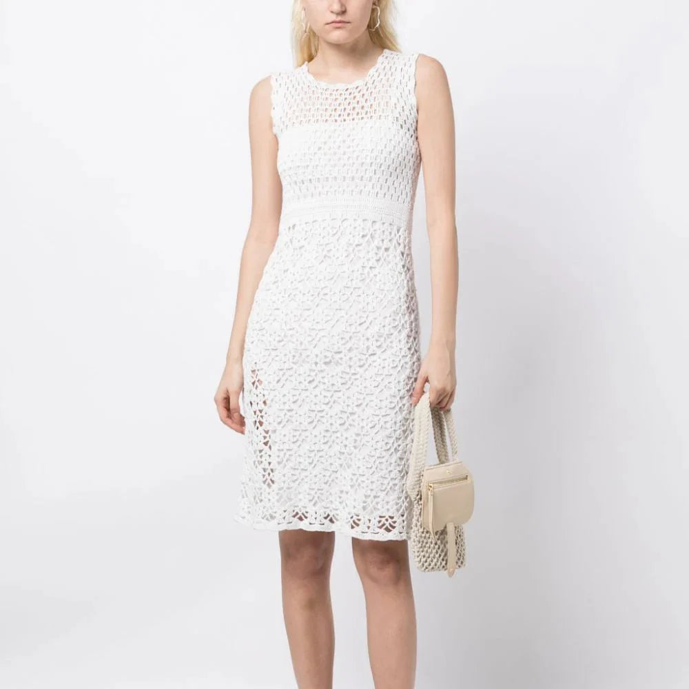 Prada sleeveless crochet dress with intricate knit pattern, stylish summer dress for warm weather, elegant and breathable fashion.
