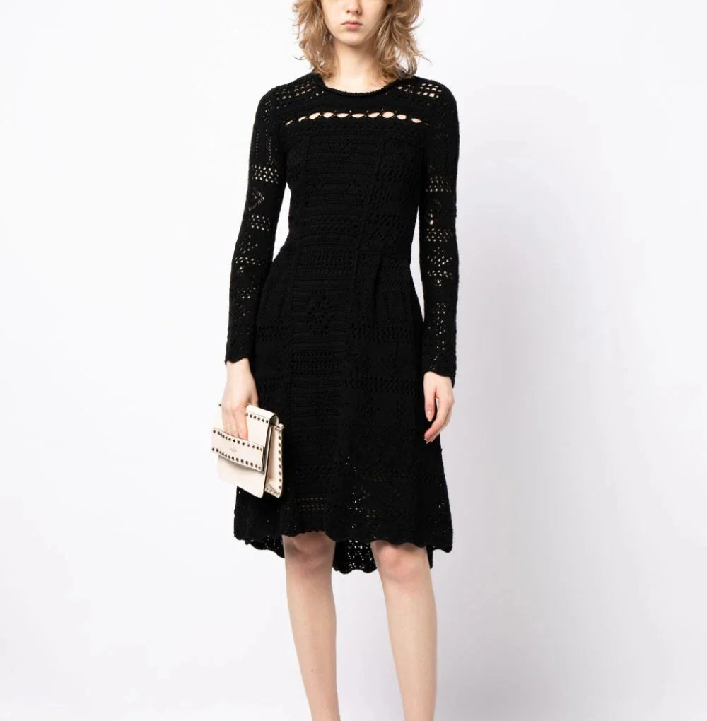 Prada long-sleeved crochet knit dress featuring intricate patterns and a fitted silhouette, perfect for stylish occasions.