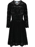 Prada long-sleeved crochet knit dress with intricate pattern, fitted silhouette, and elegant style.