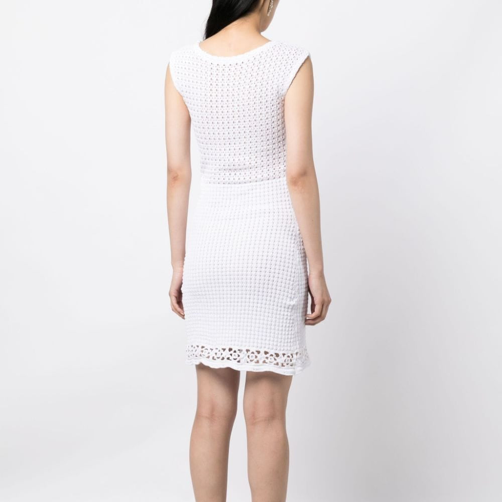 Prada white crochet knit dress featuring intricate patterns and a fitted silhouette, perfect for stylish casual or semi-formal wear.