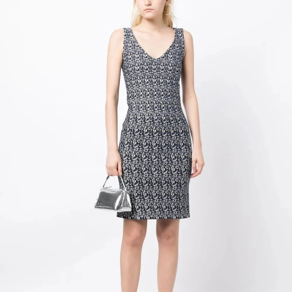 Prada abstract print compact knit dress with short sleeves and fitted silhouette, stylish and modern for elegant occasions.
