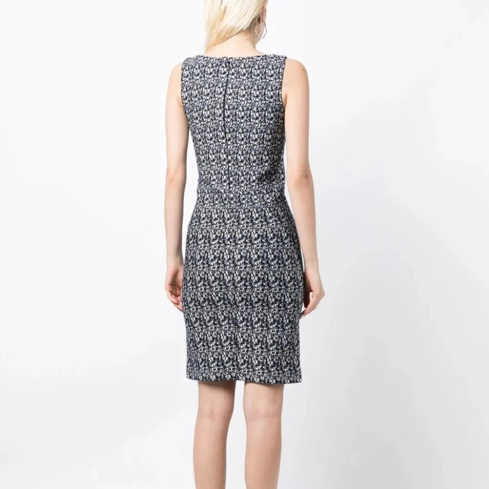 Prada abstract print compact knit dress, stylish sleeveless dress with bold geometric pattern, fitted silhouette, and round neckline.
