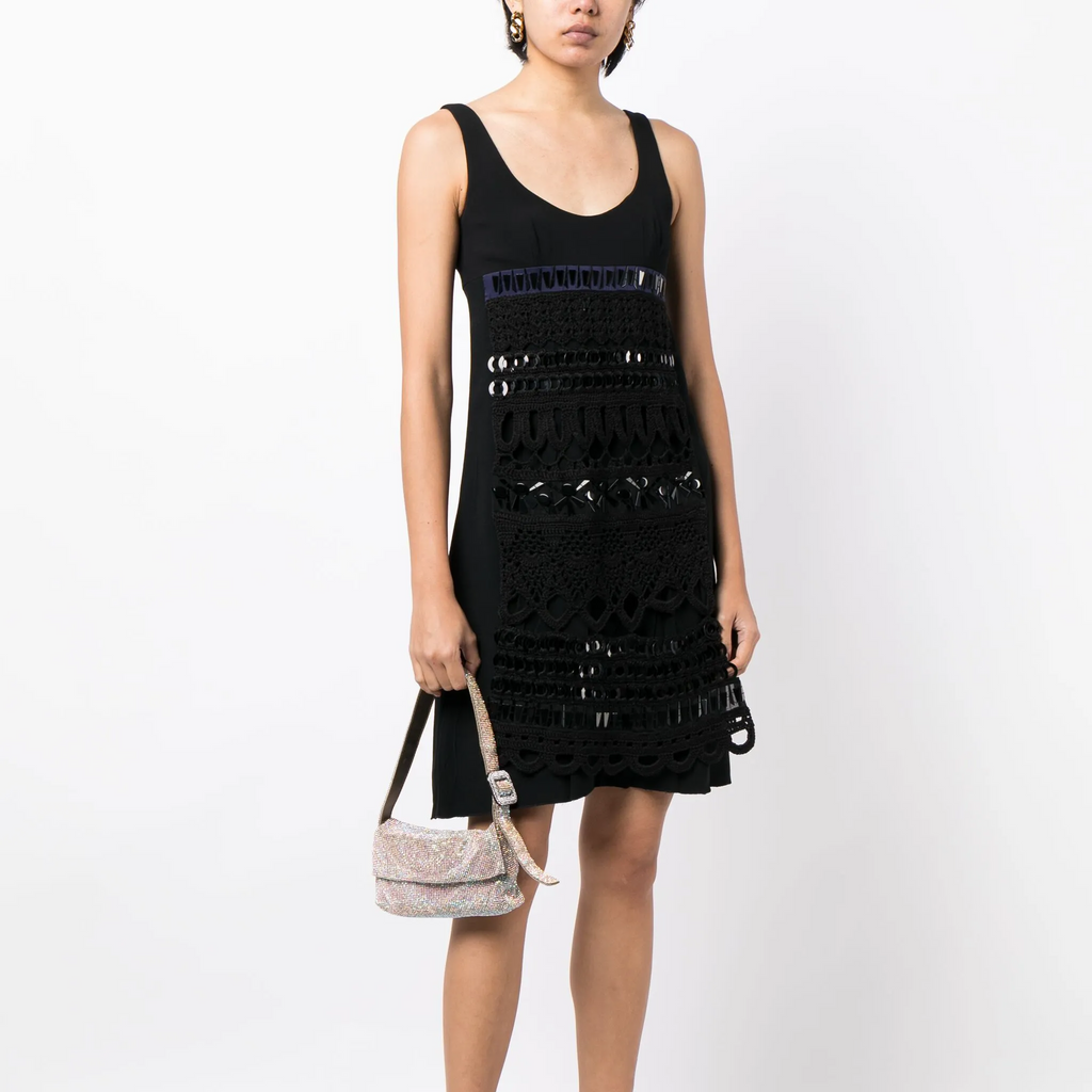 Prada 2005 panelled sleeveless dress with structured design and elegant silhouette, shown in a close-up front view.