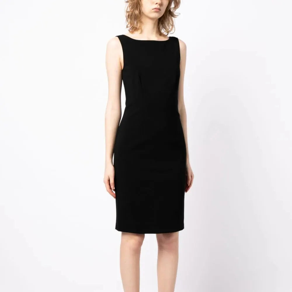Prada scoop back sleeveless dress featuring a fitted design and elegant fabric, shown on a model.