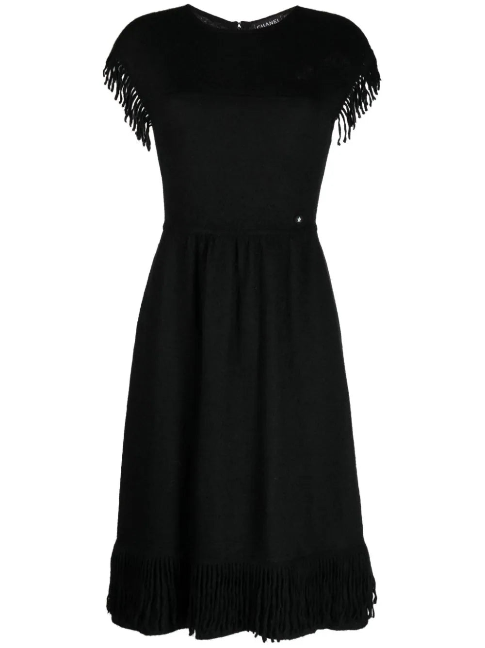 Rewind Vintage Affairs fringed knit dress with a bohemian style, featuring a textured fabric and fringe details, full-length view.
