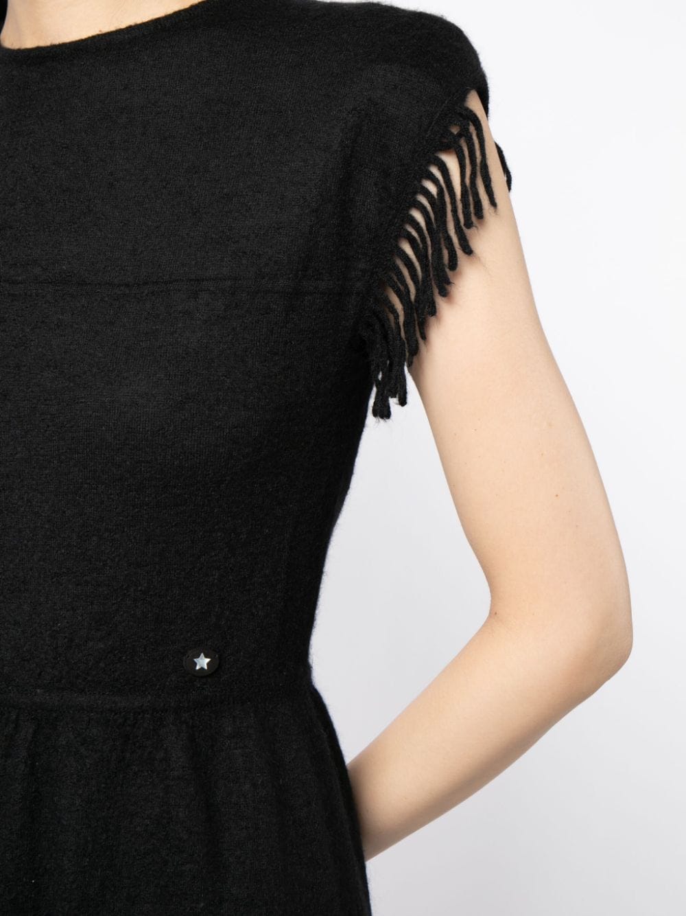 Rewind Vintage Affairs fringed knit dress featuring a boho style with textured fabric and fringe details, perfect for casual wear