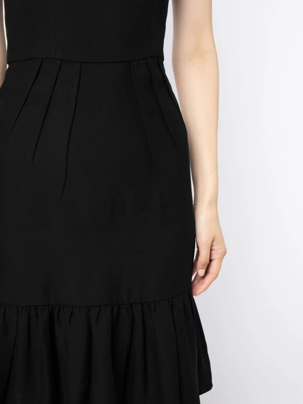 Prada ruffle hem crepe dress with flowing silhouette and elegant design, showcasing a stylish and sophisticated look.