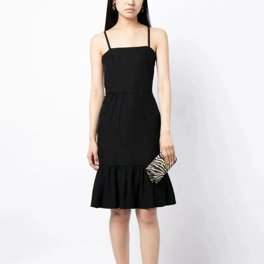Prada ruffle hem crepe dress with a feminine silhouette and elegant design, featuring a ruffled hem detail.