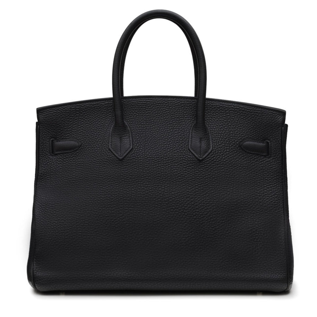 Hermès Birkin 35 Black Clemence PHW top handle bag with gold hardware and structured silhouette.