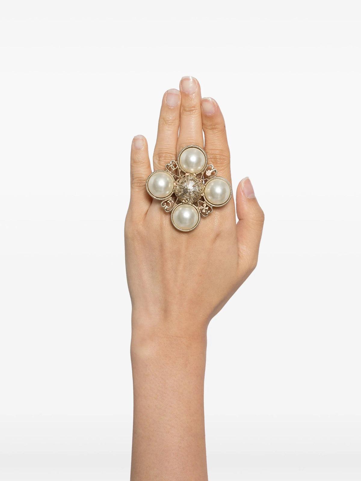 Chanel Motifs Pearl Ring with elegant design, featuring pearls and gold accents, showcasing a luxurious jewelry piece.