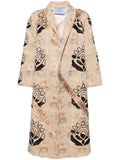 Prada embroidered floral coat displayed on a hanger, featuring vibrant floral embroidery on a stylish coat.