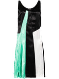 Miu Miu mid-length dress with elegant fabric and stylish design, displayed on a dress form.