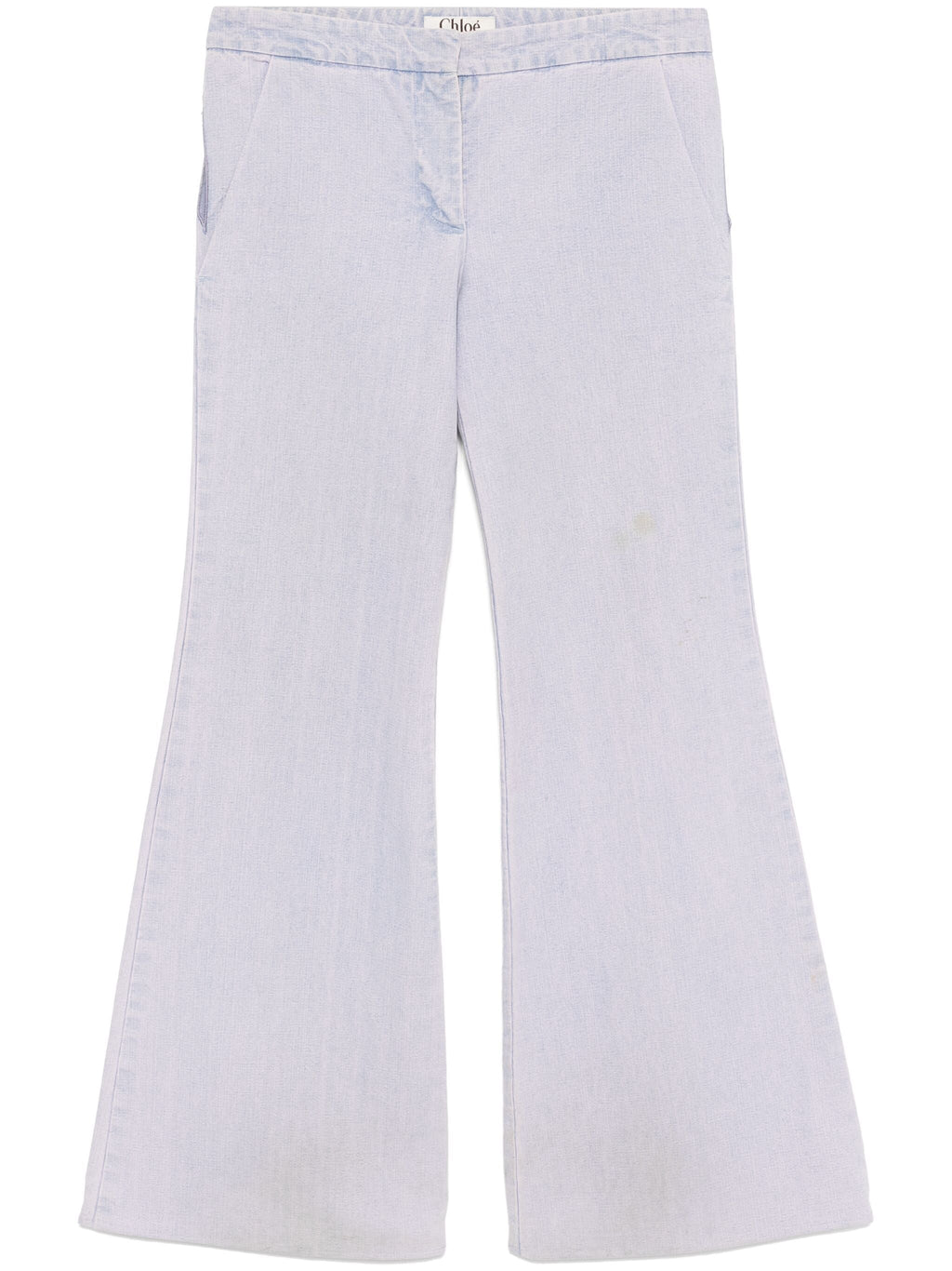 Lilac Chloé cut-out jeans trousers with distressed details and a high-waisted fit, showcasing stylish denim design.