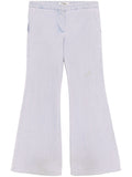 Lilac Chloé cut-out jeans trousers with distressed details and a high-waisted fit, showcasing stylish denim design.