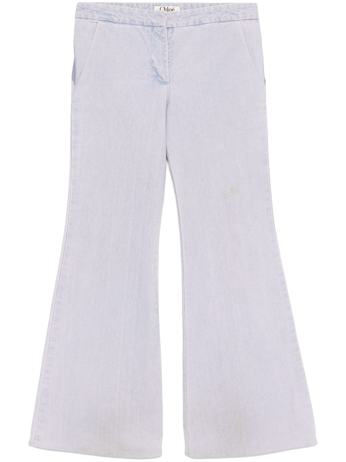 Lilac Chloé cut-out jeans trousers with distressed details and a high-waisted fit, showcasing stylish denim design.