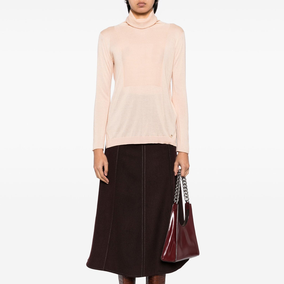 Chloé Peach Cashmere Turtleneck Jumper, cozy knit top in soft peach color, showcasing the high neckline and luxurious fabric.