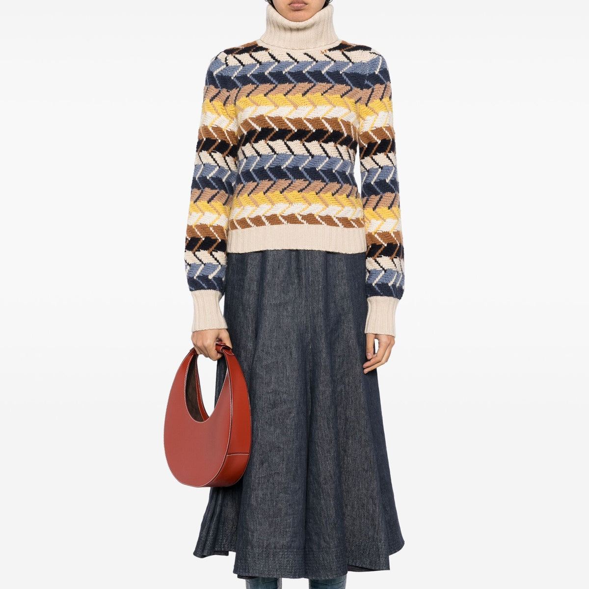 Multicoloured knit jumper by Chloé, showing a cozy, multicolored patterned top with long sleeves and ribbed cuffs.