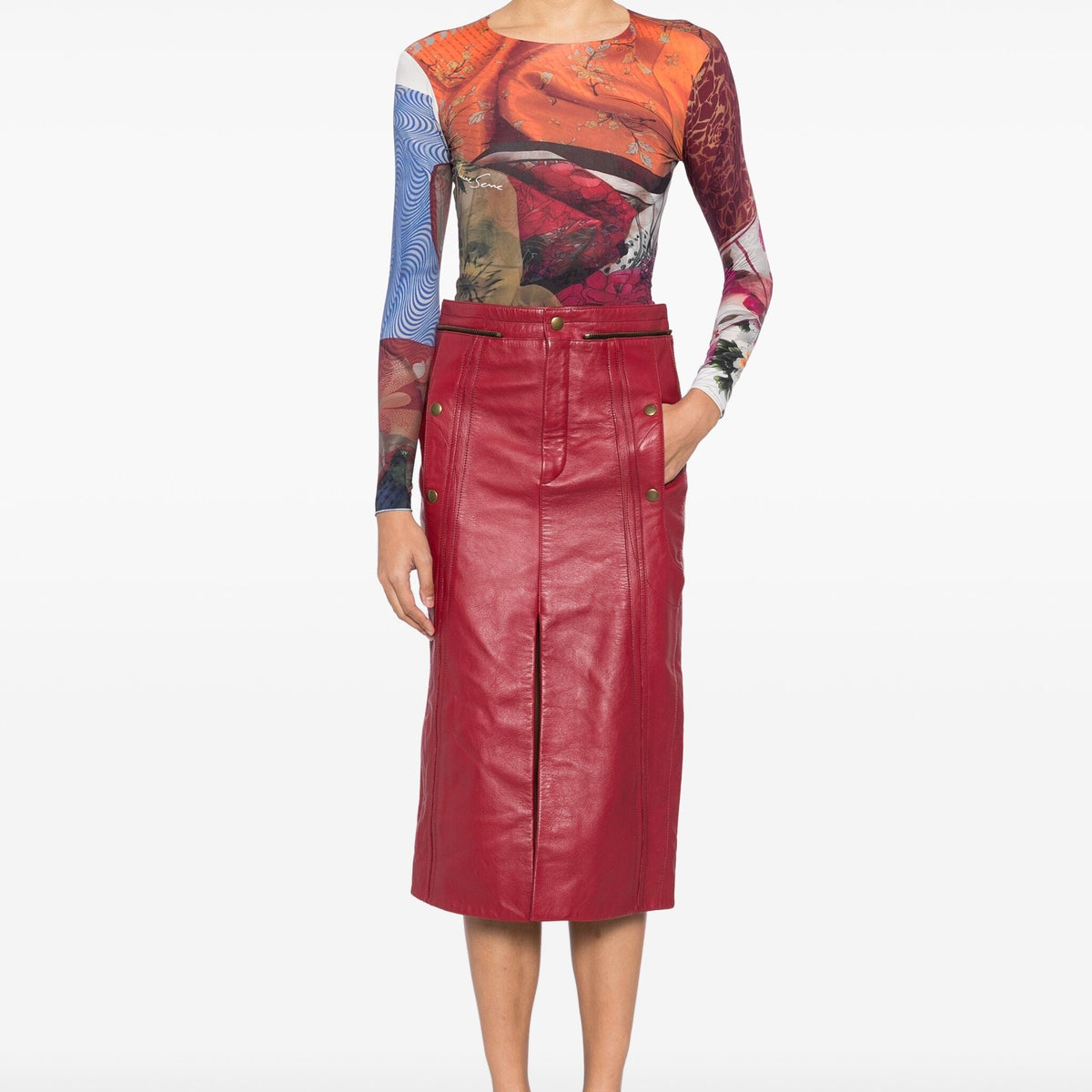 Chloé red leather pencil skirt with fitted waist and sleek design, shown on a model against a neutral background.