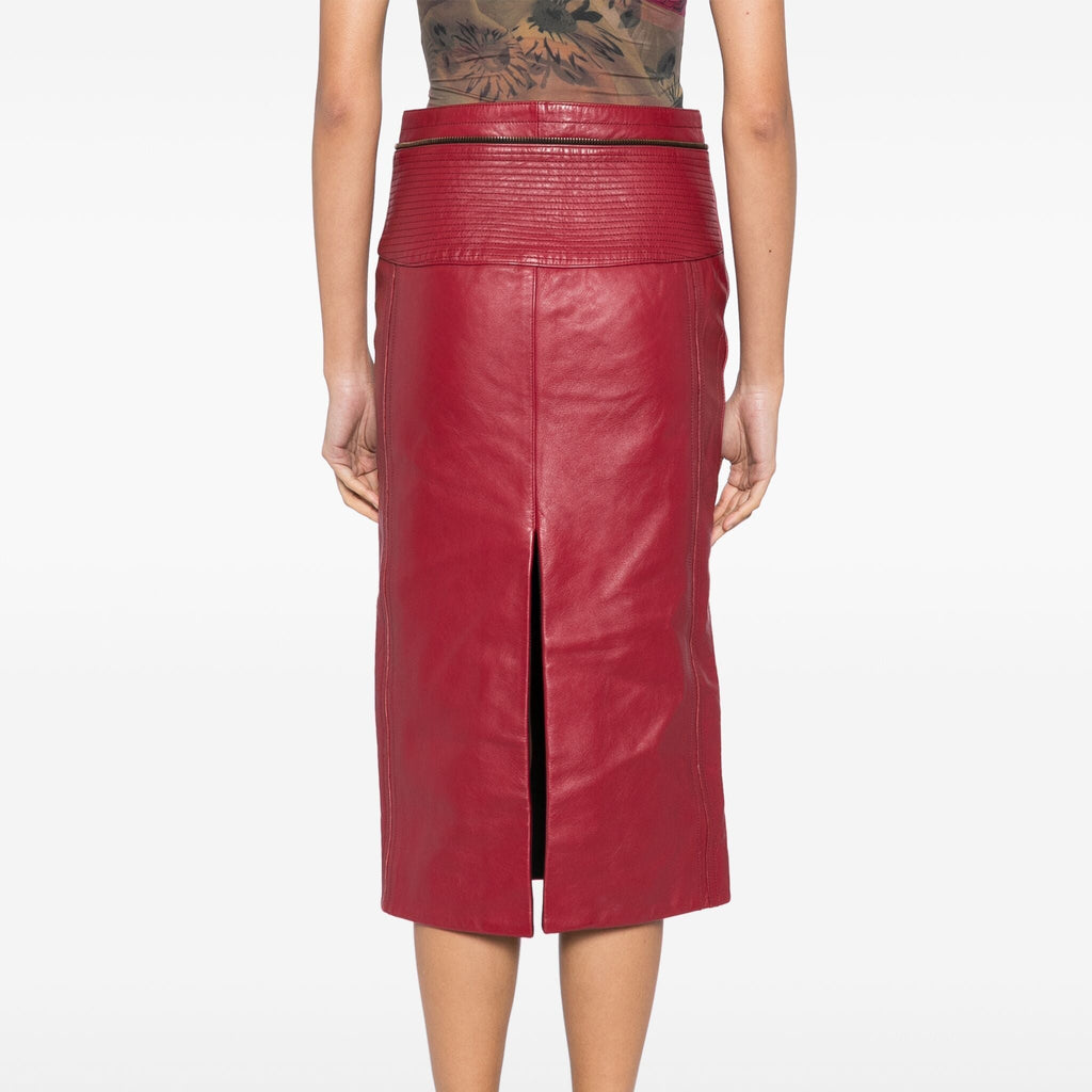 Chloé red leather pencil skirt with high waist and sleek design, shown on a model against a neutral background.