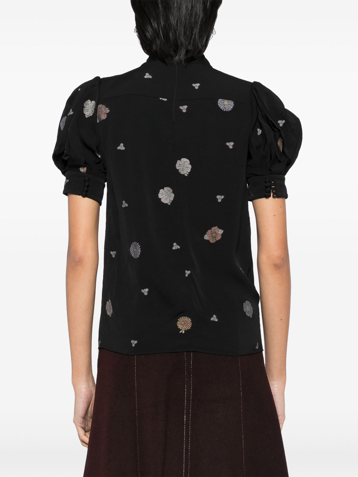 Black embroidered high-neck top from Chloé, featuring intricate embroidery and a stylish high neckline.