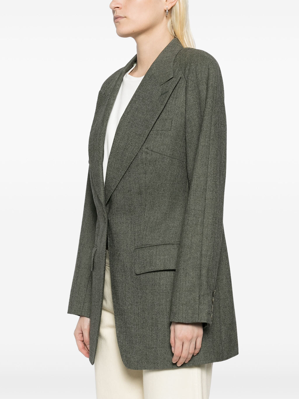 Chloé green blazer with tailored fit, lapel collar, and long sleeves, displayed on a neutral background.