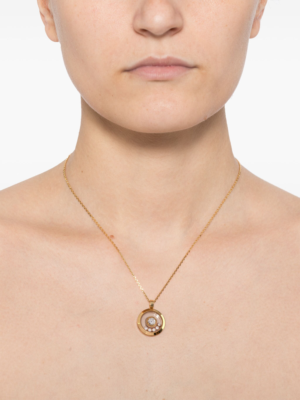 Chopard Happy Diamonds Icons Necklace featuring sparkling diamond accents and sleek gold chain in fine jewelry style.